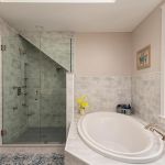 Owners bathroom soaking tub and shower