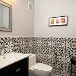 modern bathroom with black and white deco tile on the walls black and white bathroom